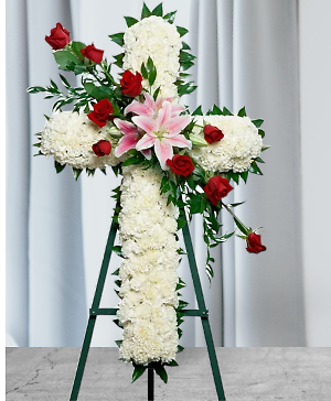 CROSS OF RED ROSES &amp; PINK LILY&#039;S ON A WHITE BASE.